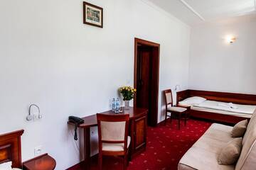 Фото номера Трехместный номер Отель Hotel Alpin г. Щирк 3