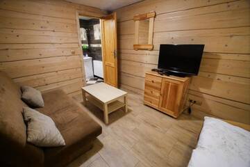 Фото номера Шале с двумя спальнями Проживание в семье Chata pod Skocznią г. Щирк 6